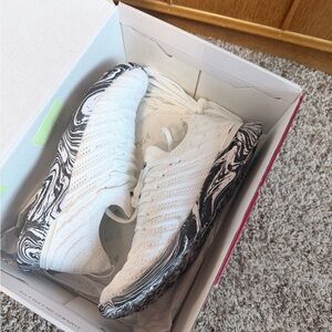 APL White Sneakers with Black Patterned Sole